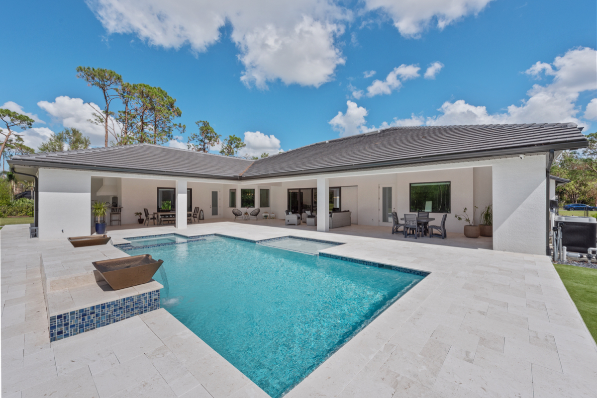 Pool and outdoor living area of a PrimeBid custom home
